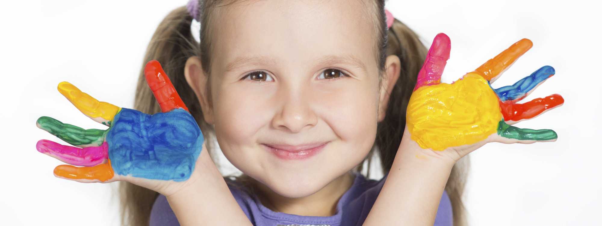 Child with paint on hands